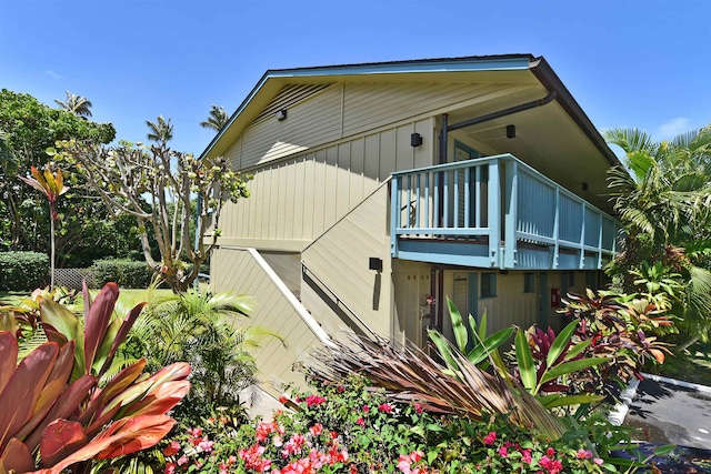 view of property exterior featuring a balcony