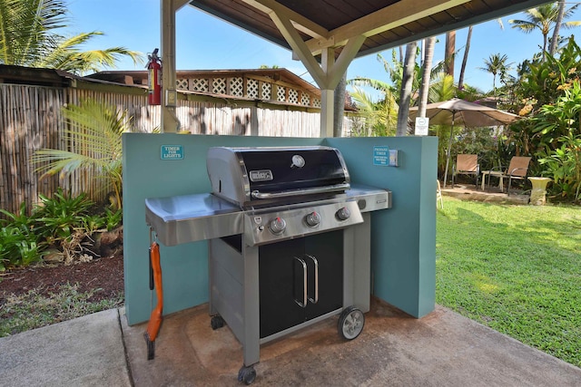 view of patio featuring a grill