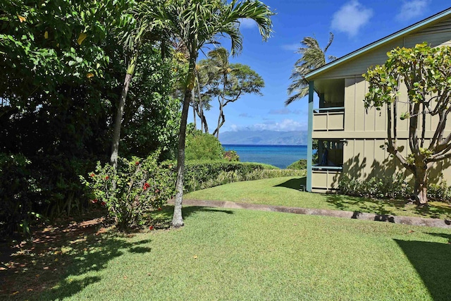 view of yard with a water view