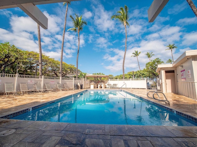 view of pool featuring a patio area