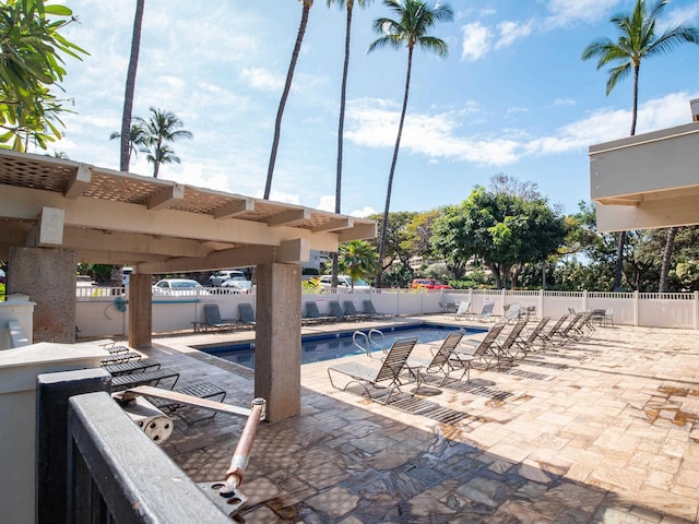 view of swimming pool featuring a patio area