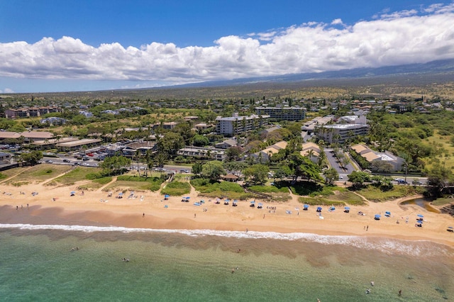 aerial view featuring a view of the beach and a water view