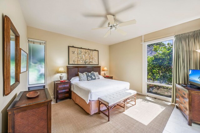 bedroom with light tile patterned floors and ceiling fan