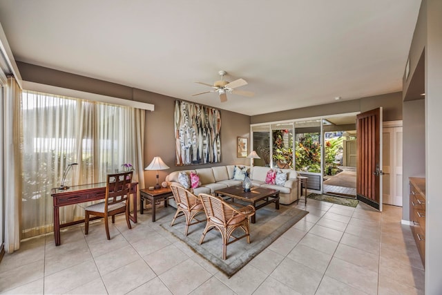 living room featuring light tile patterned flooring and ceiling fan