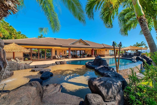 view of swimming pool with a patio area