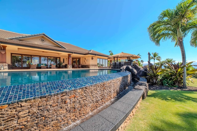 view of pool featuring a gazebo and a yard