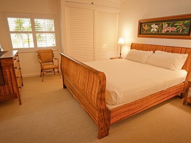 bedroom with light colored carpet