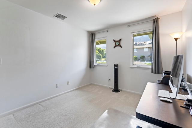 home office featuring light carpet