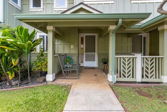 doorway to property with a porch