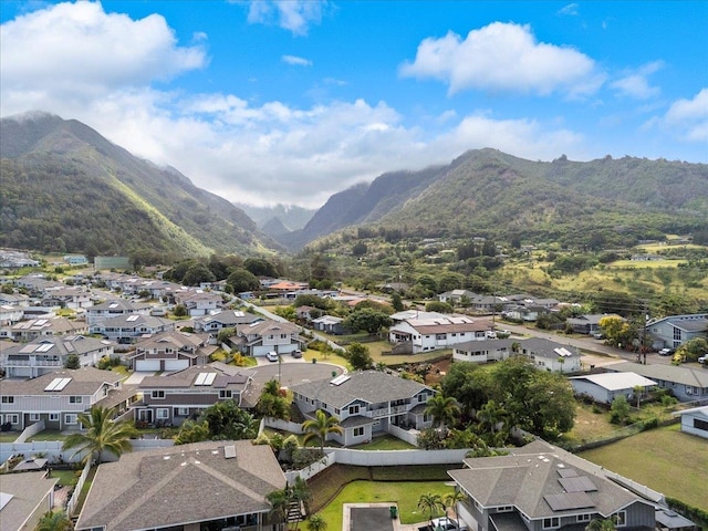 drone / aerial view featuring a residential view and a mountain view