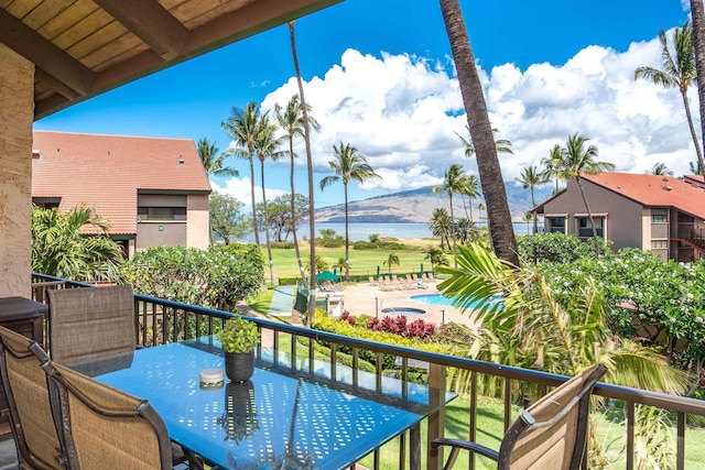 940 S Kihei Rd Unit C304, Kihei, HI 96753 - balcony with outdoor dining space and a water view