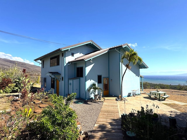 back of house featuring a patio area