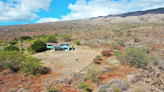 drone / aerial view featuring a mountain view