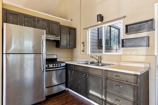 232 N Opio Pl Unit 232N, Opio Pl, Kihei, HI 96753 - kitchen featuring stainless steel appliances, under cabinet range hood, light countertops, dark wood-style flooring, and dark brown cabinetry
