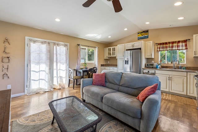 232 N Opio Pl Unit 232N, Opio Pl, Kihei, HI 96753 - living area with plenty of natural light, lofted ceiling, light wood-style flooring, ceiling fan, and recessed lighting