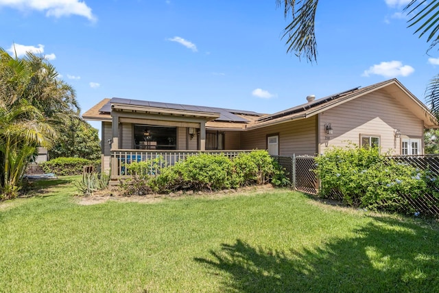 232 N Opio Pl Unit 232N, Opio Pl, Kihei, HI 96753 - back of house featuring roof mounted solar panels and a porch