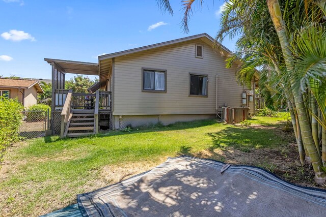 232 N Opio Pl Unit 232N, Opio Pl, Kihei, HI 96753 - back of house with a deck and a patio area