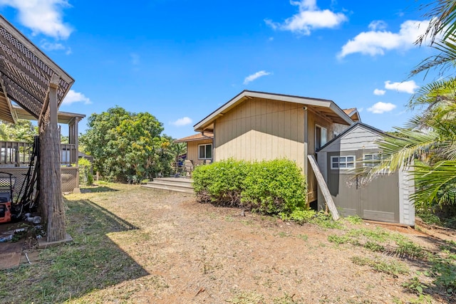 232 N Opio Pl Unit 232N, Opio Pl, Kihei, HI 96753 - view of home's exterior featuring a storage unit