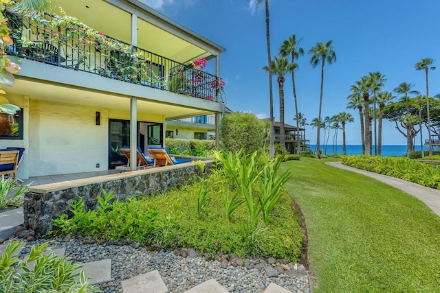 view of yard with a water view