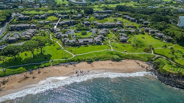 aerial view with a water view and a view of the beach