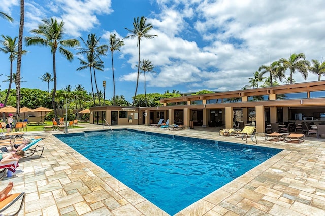 view of swimming pool featuring a patio