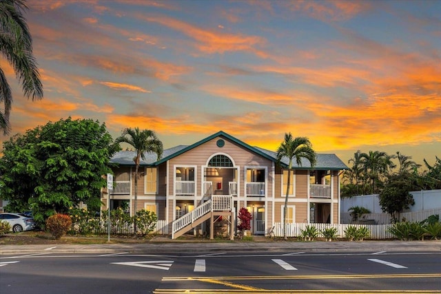 view of outdoor building at dusk