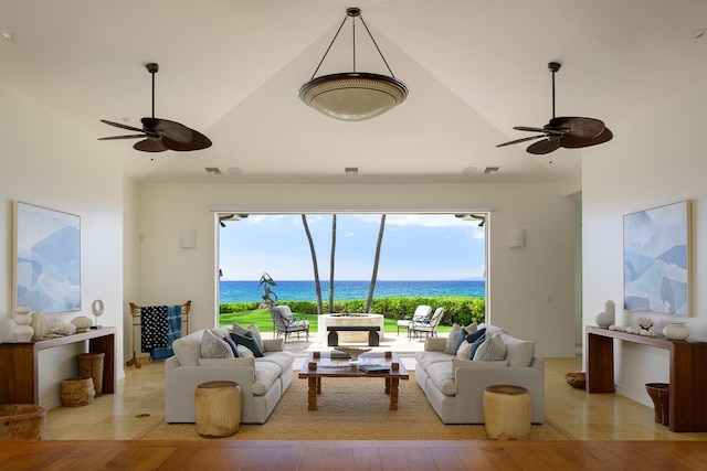 living room featuring a water view, light wood-style flooring, and a ceiling fan