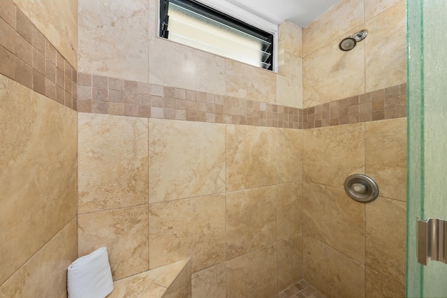 room details featuring tiled shower