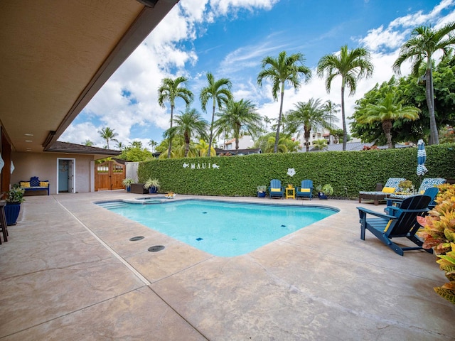 view of swimming pool featuring a patio