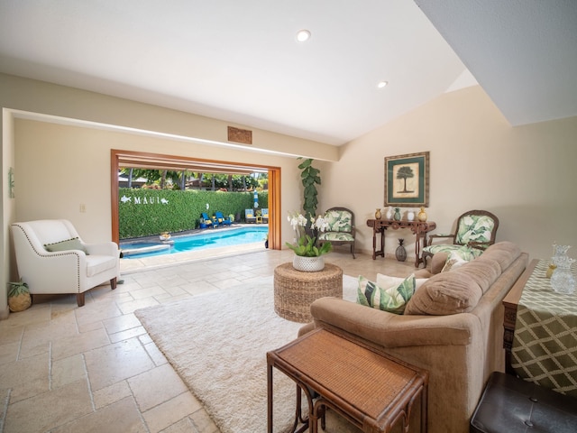 living room with lofted ceiling