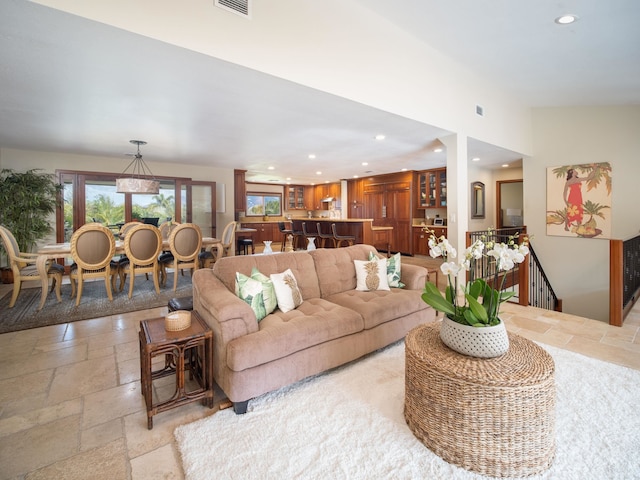 living room with vaulted ceiling