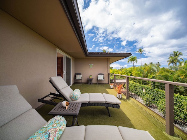 view of patio with a balcony