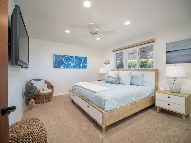 carpeted bedroom featuring ceiling fan