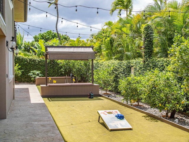 view of patio with a jacuzzi