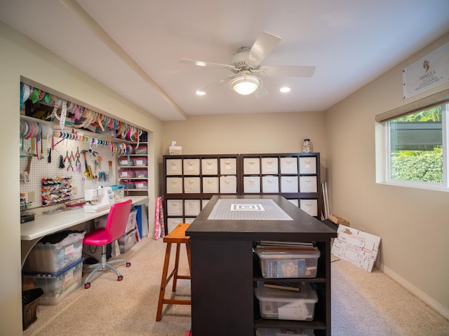 office space with carpet and ceiling fan