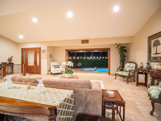 living room with lofted ceiling