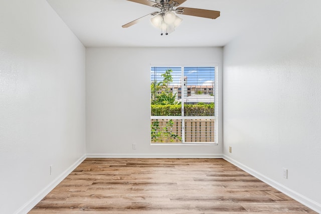 480 Kenolio Rd Unit 22-105, Kihei, HI 96753 - unfurnished room featuring light wood-type flooring and a ceiling fan