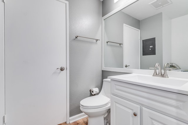 480 Kenolio Rd Unit 22-105, Kihei, HI 96753 - half bathroom featuring vanity and wood finished floors