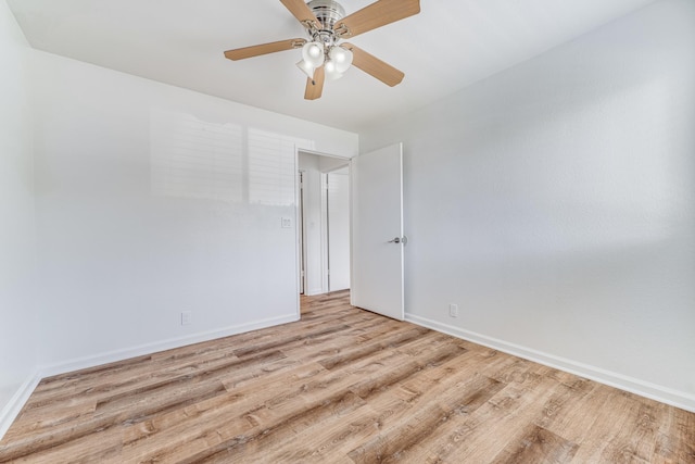 480 Kenolio Rd Unit 22-105, Kihei, HI 96753 - spare room featuring wood finished floors and ceiling fan