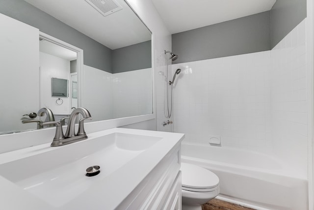 480 Kenolio Rd Unit 22-105, Kihei, HI 96753 - full bathroom featuring vanity, shower / washtub combination, and wood finished floors