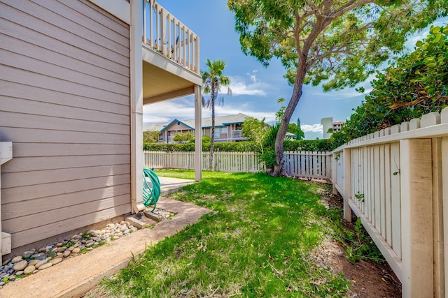 480 Kenolio Rd Unit 22-105, Kihei, HI 96753 - fenced backyard featuring a balcony