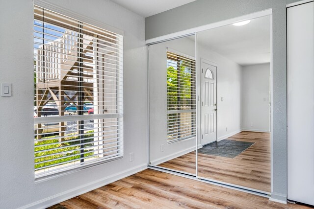 480 Kenolio Rd Unit 22-105, Kihei, HI 96753 - entryway featuring wood finished floors