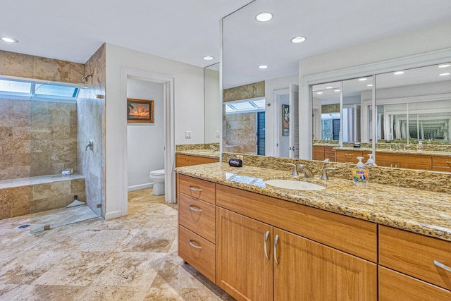500 Bay Dr Unit 12G4, Lahaina, HI 96761 - bathroom featuring a walk in shower, toilet, vanity, and recessed lighting