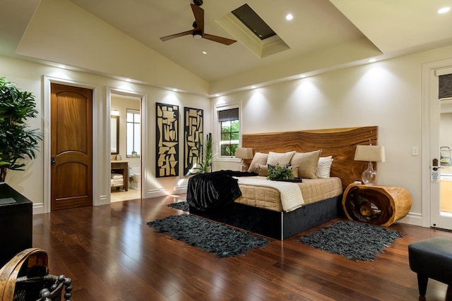 bedroom with vaulted ceiling, ceiling fan, and dark wood-type flooring