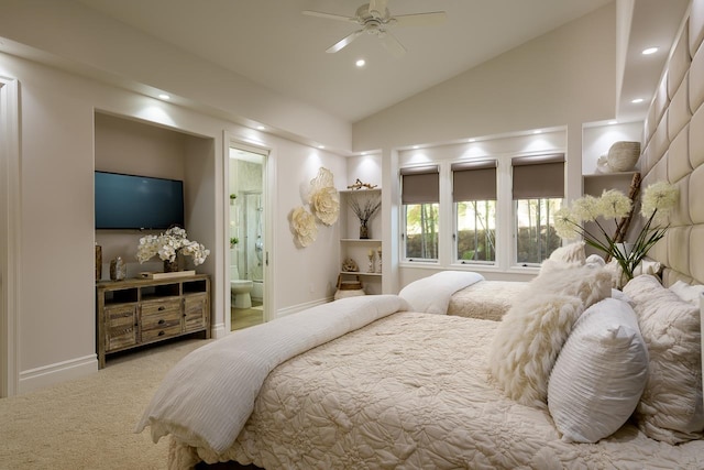 bedroom with ceiling fan, carpet floors, connected bathroom, and high vaulted ceiling