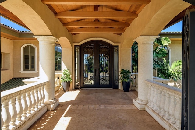 entrance to property featuring french doors