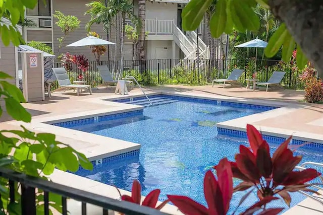 view of pool featuring a patio area