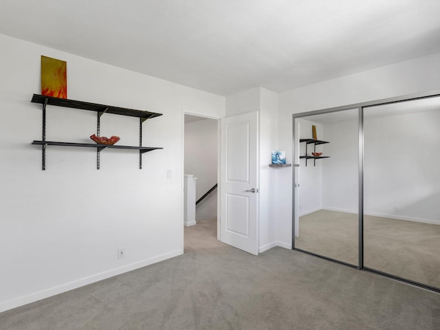 68 Walaka St Unit 5, Kihei, HI 96753 - unfurnished bedroom featuring carpet floors and a closet