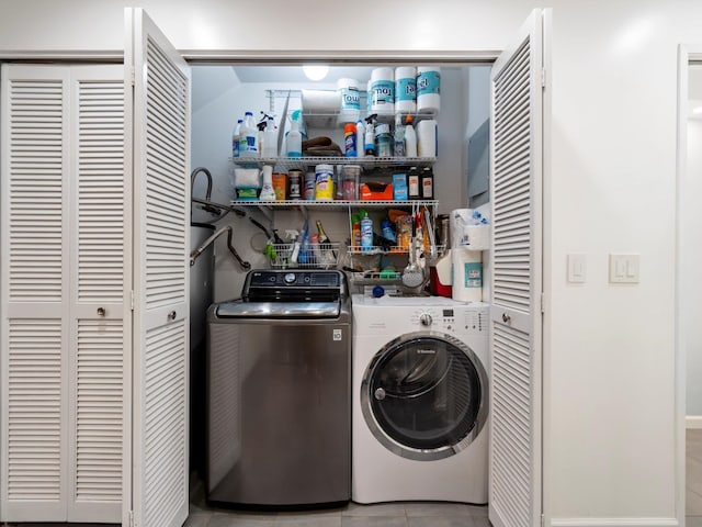 68 Walaka St Unit 5, Kihei, HI 96753 - washroom featuring independent washer and dryer and tile patterned flooring