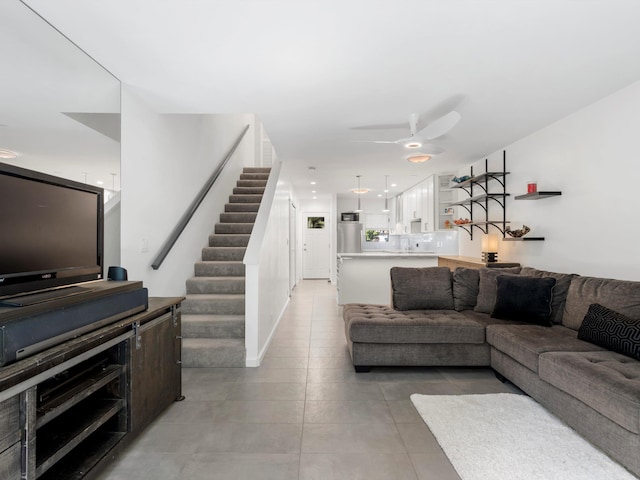 68 Walaka St Unit 5, Kihei, HI 96753 - living room featuring light tile patterned floors, stairway, and a ceiling fan
